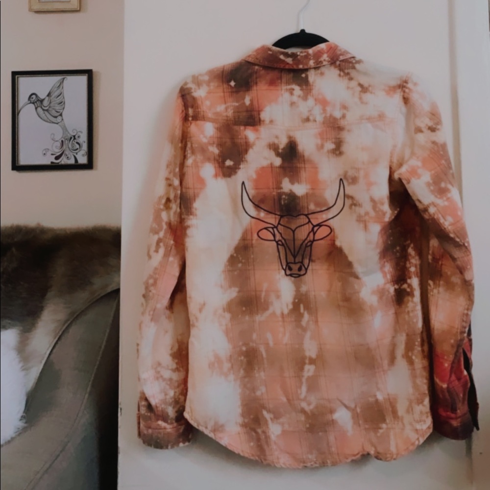 Bleach dye flannel with bull print on back